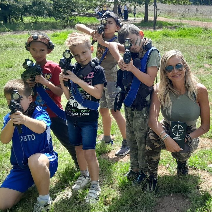 A family group aiming together